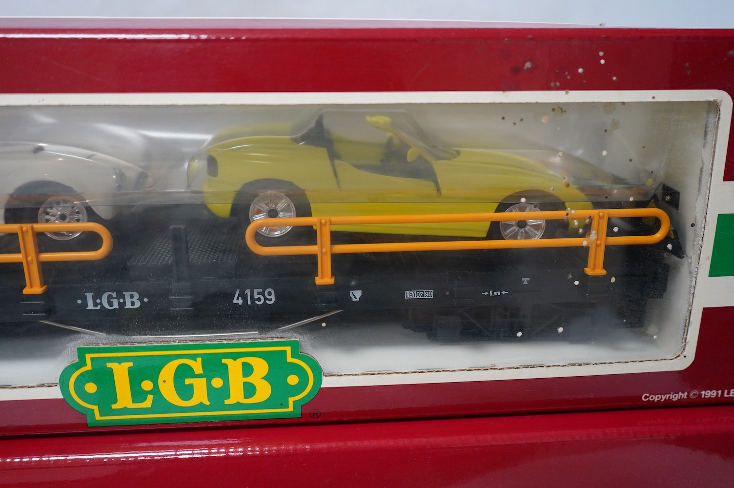 Four boxed Lehmann LGB G scale bogie rolling stock; a tanker (4080-Y 05), a car transporter (4159), And two Denver and Rio Grande Western Railway coaches (3081 and 4075). Condition - good.